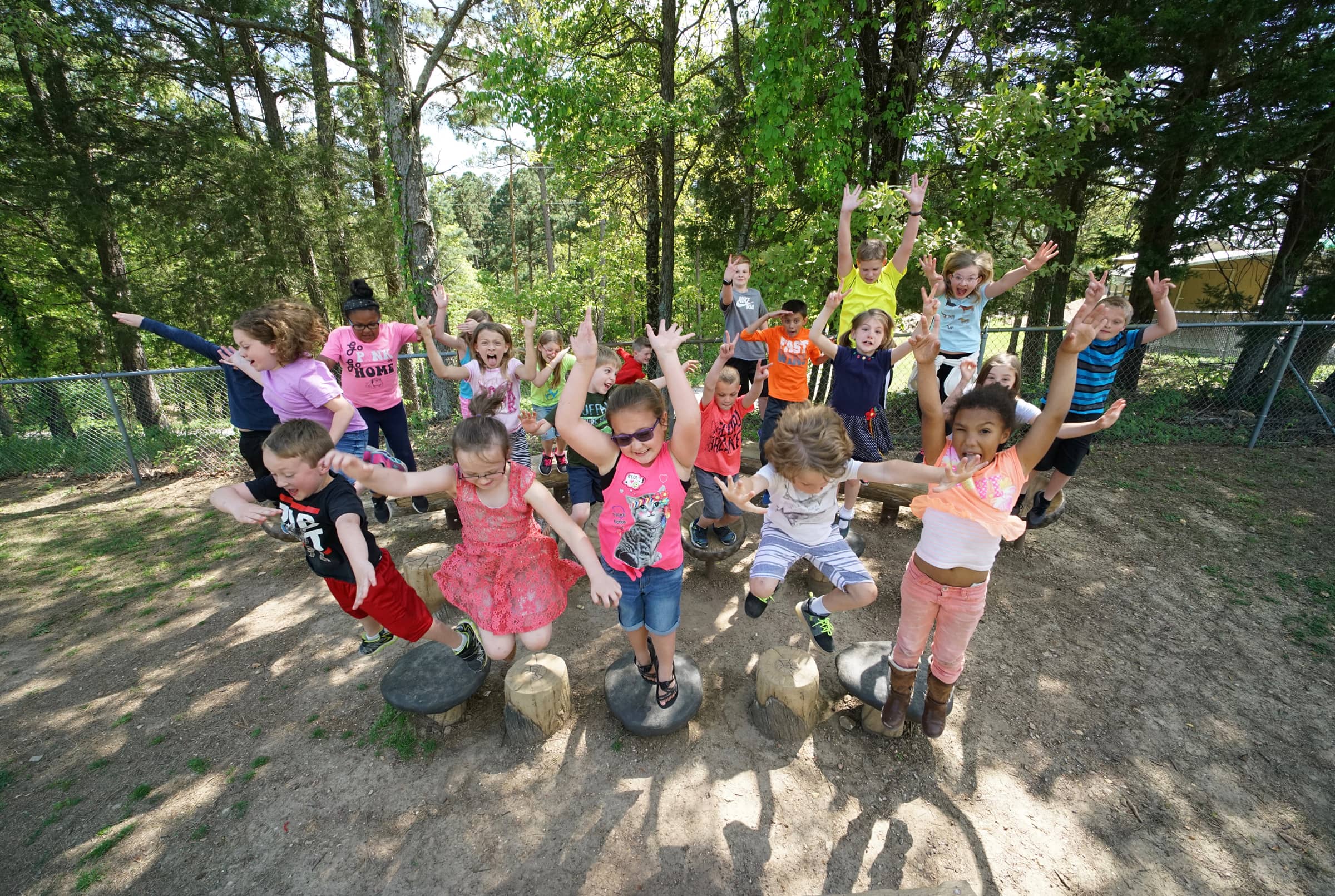 Young children playing outdoors