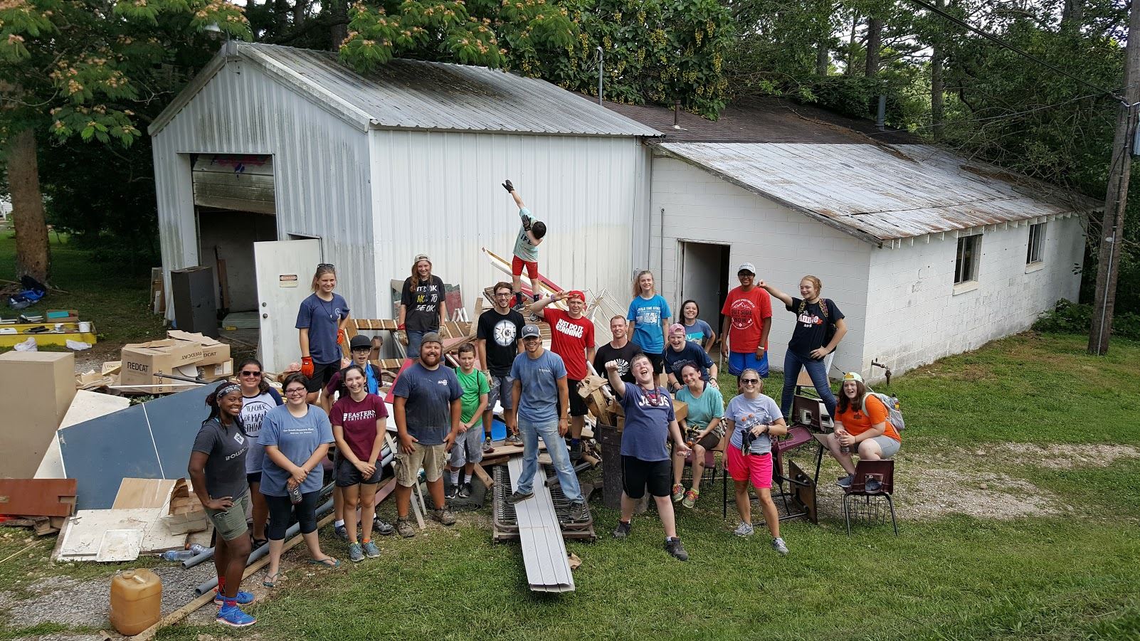 Outdoors-teens helping with cleanup