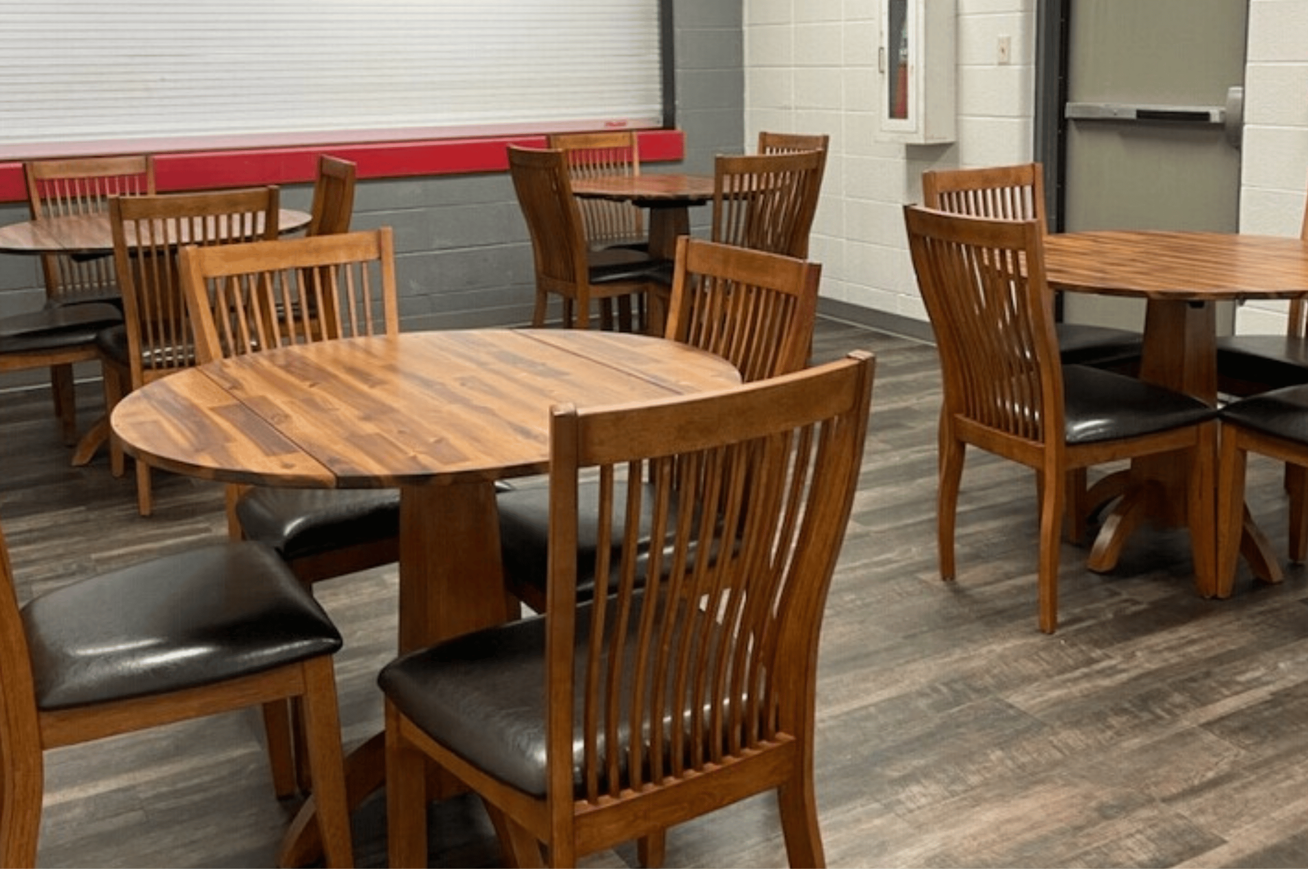 Main Lobby wooden tables and chairs