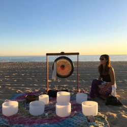 woman on beach, sound musical bowls and gong