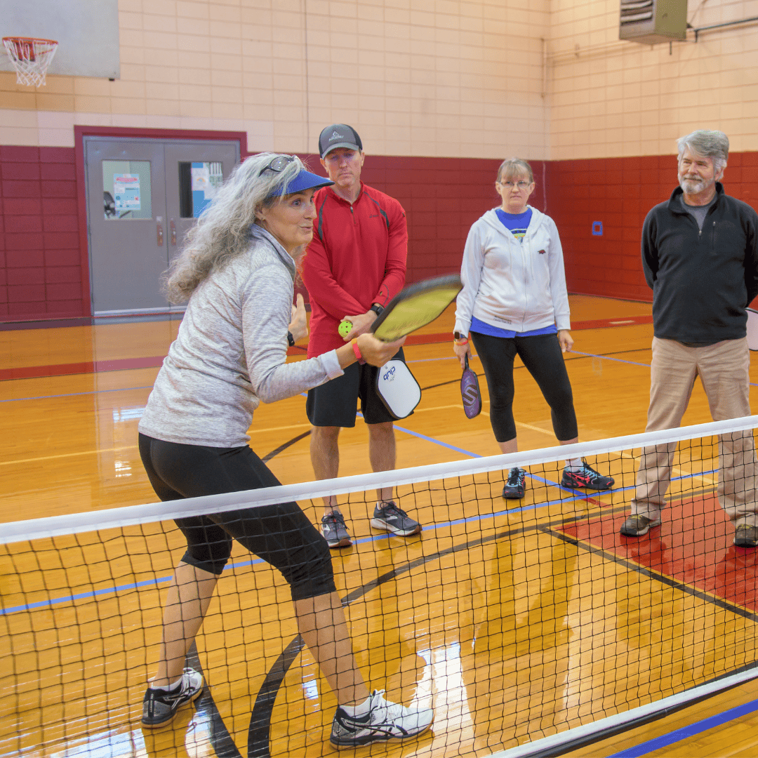 pickleball adults playing pickleball in the gym
