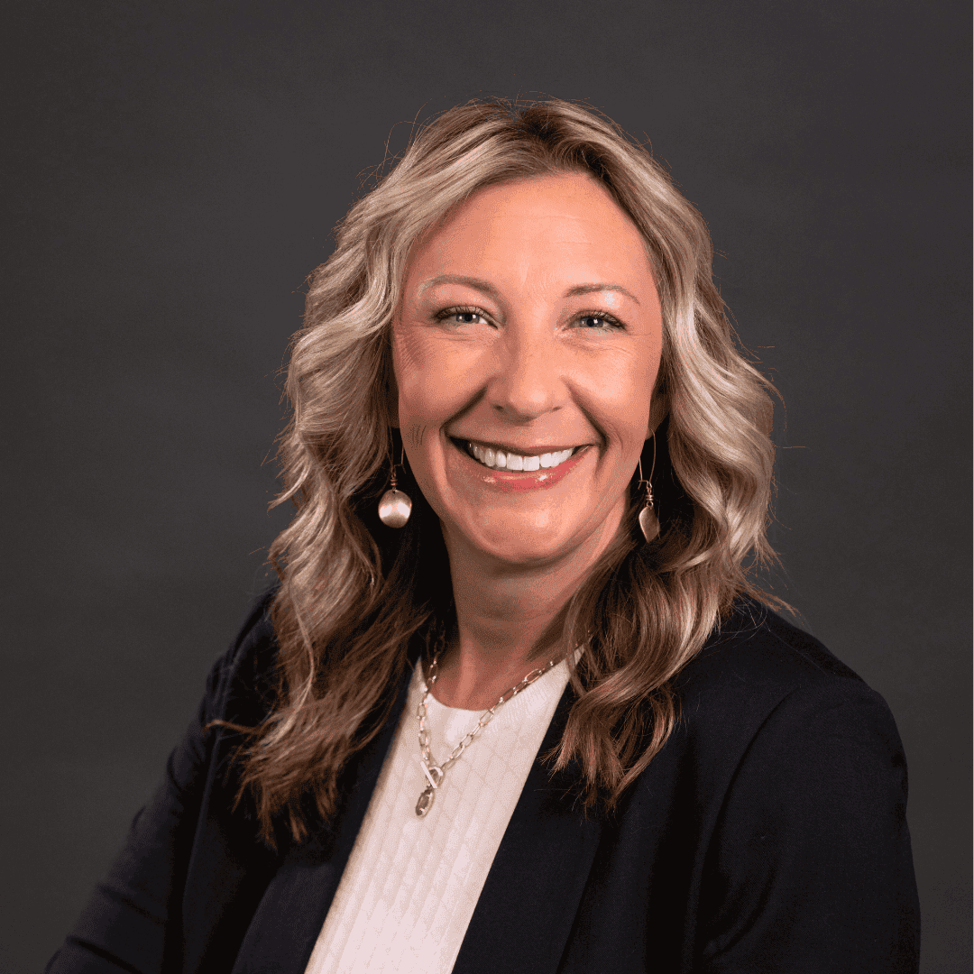 headshot, woman smiling into the camera